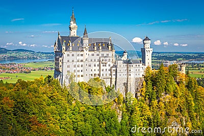 Neuschwanstein castle at golden autumn in Bavarian Alps, Germany Stock Photo