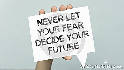 Never let your fear decide your future, text words Stock Photo