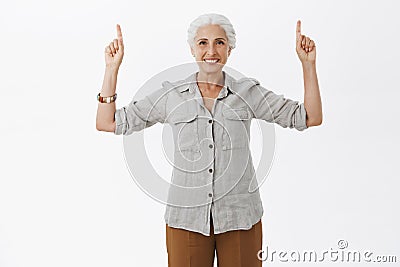 Never too late to start moving forward. Portrait of charming carefree and delighted energized granny with beautiful Stock Photo