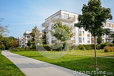 New apartment building - modern residential development in a green urban settlement Stock Photo