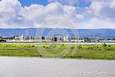 New apartment buildings under construction on the shoreline of San Francisco bay Stock Photo