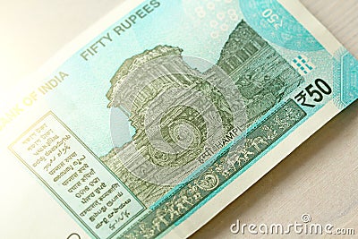 A new banknote of India with a denomination of 50 rupees. Indian currency. The other side, Hampi`s chariot Stock Photo