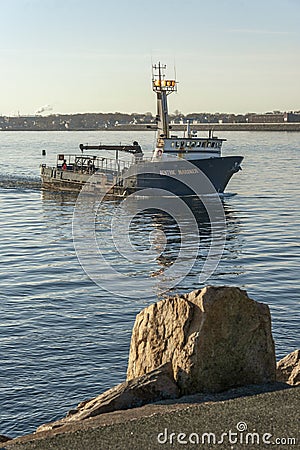 Commercial fishing boat Benthic Mariner near hurricane barrier Editorial Stock Photo