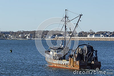 Dragger Ruthie B. heading out to sea Editorial Stock Photo