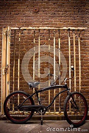 New Bike, Old Gate Stock Photo