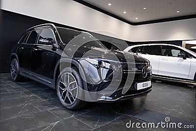 new black Mercedes EQB electric SUV 4MATIC car in showroom, EV contemporary Europe, technological advancements in automotive Editorial Stock Photo