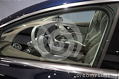 new blue electric Mercedes EQS 580 4MATIC car in showroom, EV contemporary, technological advancements in automotive industry, Editorial Stock Photo