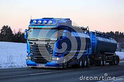 New Blue Scania Tank Truck Trucking in the Winter Twilight Editorial Stock Photo