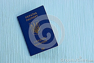 Blue Ukrainian passport lies on the table Stock Photo