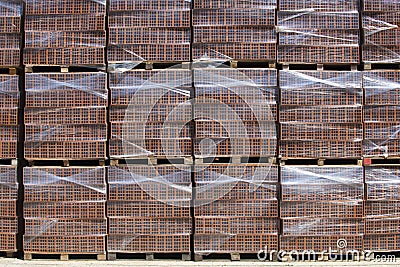 New bricks on stacked pallets Stock Photo