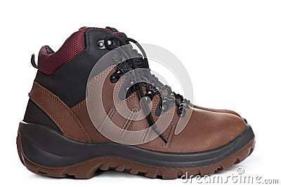 New brown working boots on a white background. Stock Photo