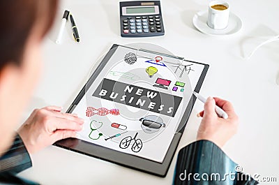 New business concept on a clipboard Stock Photo