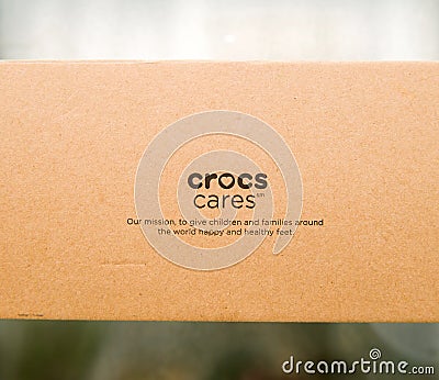 New cardboard box with Crocs shoes Editorial Stock Photo