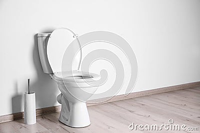 New ceramic toilet bowl in bathroom Stock Photo