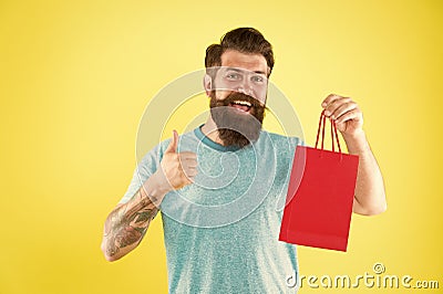 New collection. happy hipster hold paperbag. Man with gift package. Buy product. little pleasantness. bearded man go Stock Photo