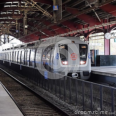 New Delhi, India, February 17 2024 - Delhi Metro train arriving at Jhandewalan metro station in New Delhi, India, Asia, Public Editorial Stock Photo