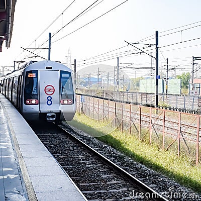 New Delhi, India, February 17 2024 - Delhi Metro train arriving at Jhandewalan metro station in New Delhi, India, Asia, Public Editorial Stock Photo