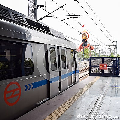 New Delhi India â€“ June 21 2022 - Delhi Metro train arriving at Jhandewalan metro station in New Delhi, India Editorial Stock Photo