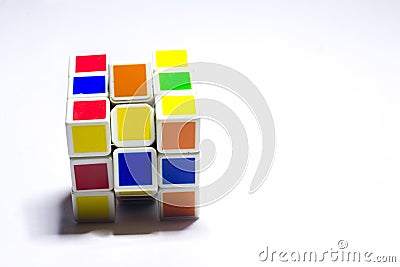 New Delhi, India - May 10, 2019. Rubik`s cube color blue, white, orange, green, yellow on white background with space for text Editorial Stock Photo