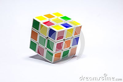 New Delhi, India - May 10, 2019. Rubik`s cube color blue, white, orange, green, yellow on white background with space for text Editorial Stock Photo