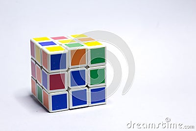 New Delhi, India - Oct 10, 2019. Rubik`s cube color blue, white, orange, green, yellow on white background with space for text Editorial Stock Photo