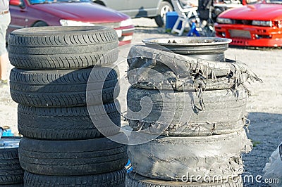 New and destroyed tires and burnt tire tread on car drifting Stock Photo