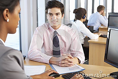 New Employee Starting Work In Busy Office Stock Photo