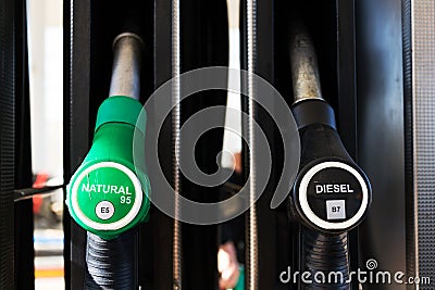 New fuel labeling at petrol station pumps with new EU labels Stock Photo