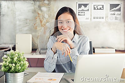 New generation asians business woman using laptop at office Stock Photo
