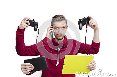 New generation technology concept. Young man with five arms holding tech gadgets Stock Photo