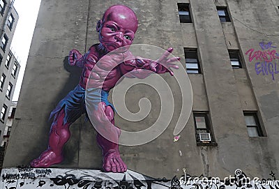 New giant pink Temper Tot mural by Ron English in Little Italy in Manhattan. Editorial Stock Photo