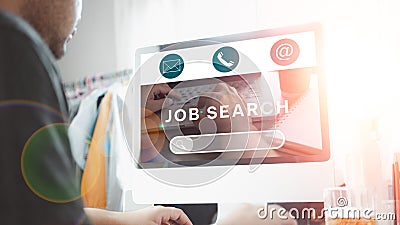 Young jobless seeker looking for new vacancies on website page at home, recruitment concept Stock Photo