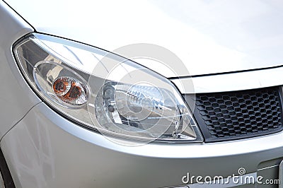new gray car headlight and arrow, right front view, power, transport, speed Stock Photo