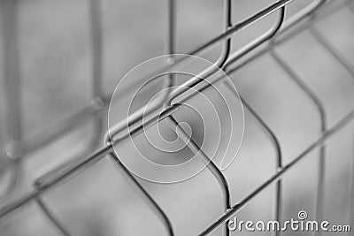 New grid fence closeup. Perspective view. Selective focus Stock Photo