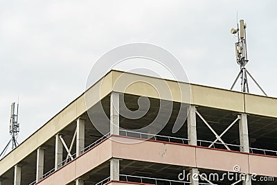 New GSM antennas on the roof of a residential building in the city for transmitting a 5g signal are a danger to human health. Stock Photo