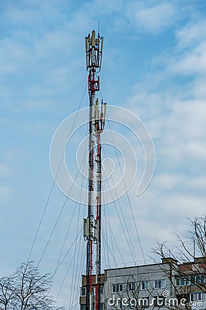 New GSM antennas on the roof of a residential building in the city for transmitting a 5g signal are a danger to human health. Stock Photo