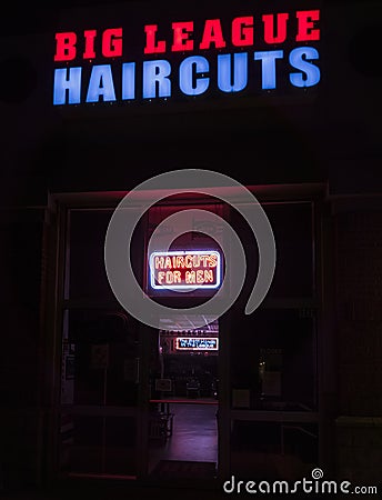 New Hartford, New York - Aug 14, 2019: Low Key Image for the Storefront Neon Lights of the Big League Haircuts, Big League Editorial Stock Photo