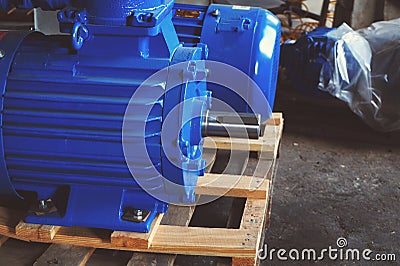 New electric motors of blue color of high power are in stock and ready for use. Stock Photo