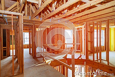 New home construction with wooden house frame Stock Photo