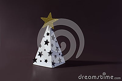 A new hope concept. Light decorated pyramid on dark background Stock Photo