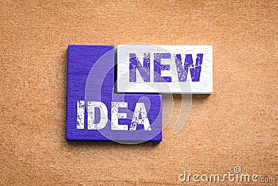 NEW IDEA. Creativity, business, marketing and training concept. Colored wooden blocks, puzzle and mind game Stock Photo