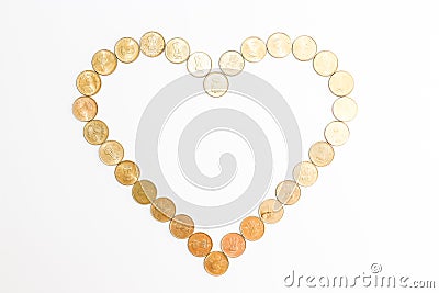 New indian coins on white background. Heartshape concept Stock Photo