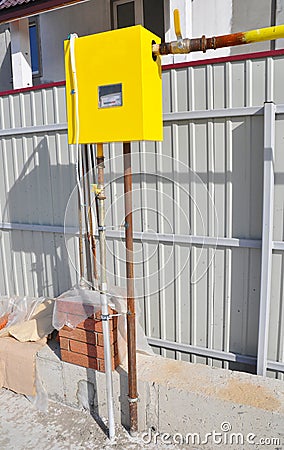 New Installed Gas Pipes Connection with Natural Gas Meter on the Construction Site Outside. Natural gas pipe installation. Stock Photo