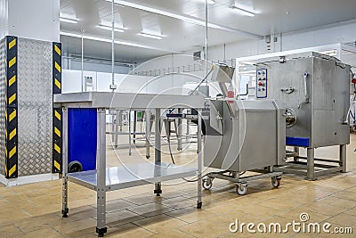 New interior of a packaging production line at a semi-finished factory Stock Photo