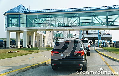 New Jersey, U.S - June 18, 2023 - Cars moving into the Cape May - Lewes ferry Editorial Stock Photo