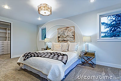 New luxury custom built home with white master bedroom. Stock Photo