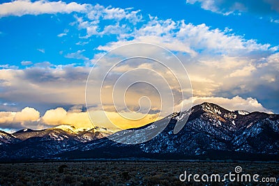 New Mexico Sangre De Cristo Taos Mountains with Snow Sunset Stock Photo