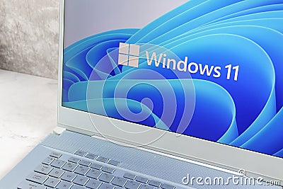 New Microsoft Windows 11 logo on computer screen Editorial Stock Photo
