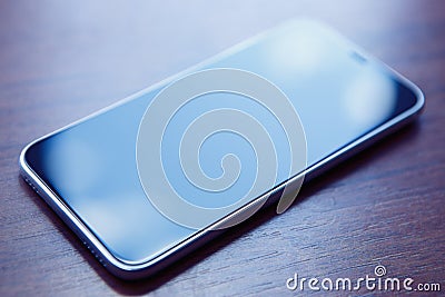 New mobile phone with black touch screen Stock Photo