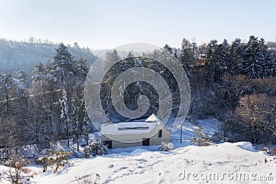 New modern dream house apartments in snowy valley on sunny freezing winter day Stock Photo